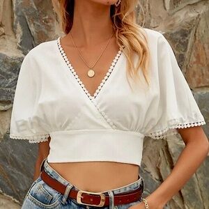 Bow tie back detailed white blouse